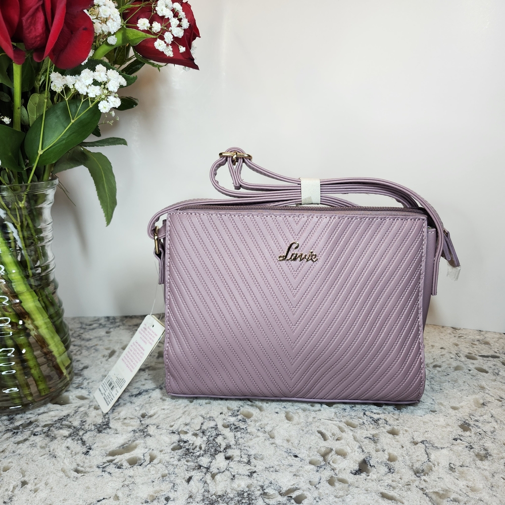 Purple Crossbody Bag with Quilted Pattern and Structured Shape
